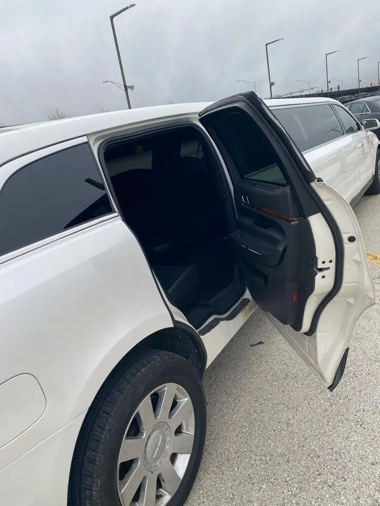 Back right door of white limousine