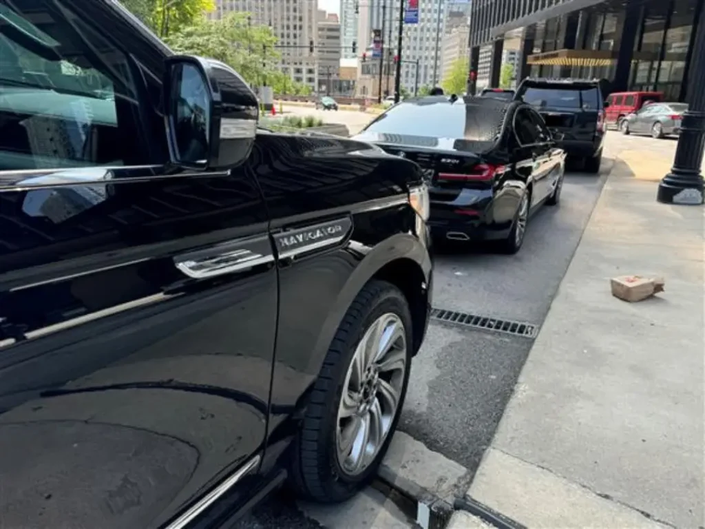 side right view of black sedan