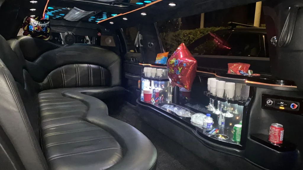 inside of limousine with drink table