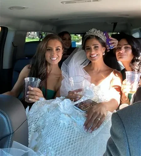 Bride and bridesmaids looking forward in Wedding Limo Service NYC