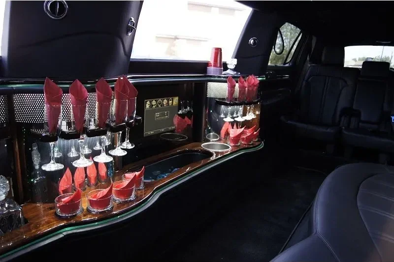 inside of limousine with drink table