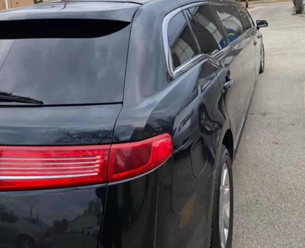 back right view of black limousine