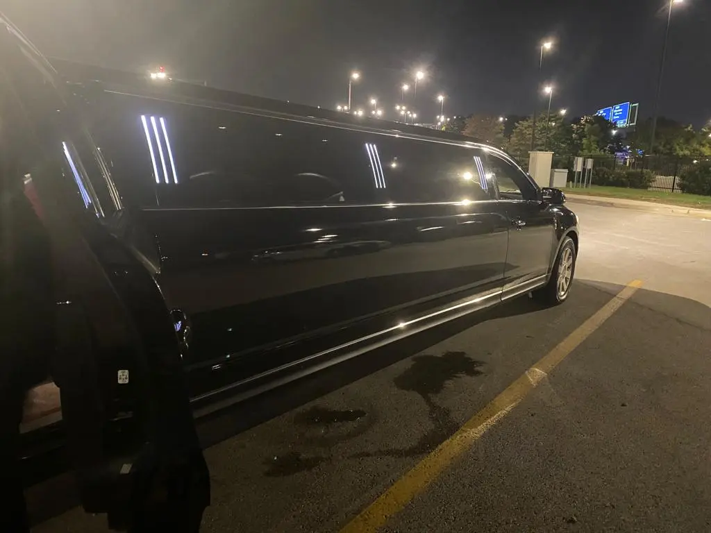 Back side view of black stretch limo