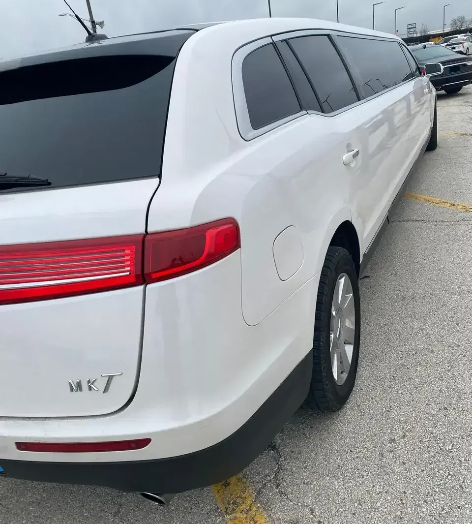 White Limo side parked