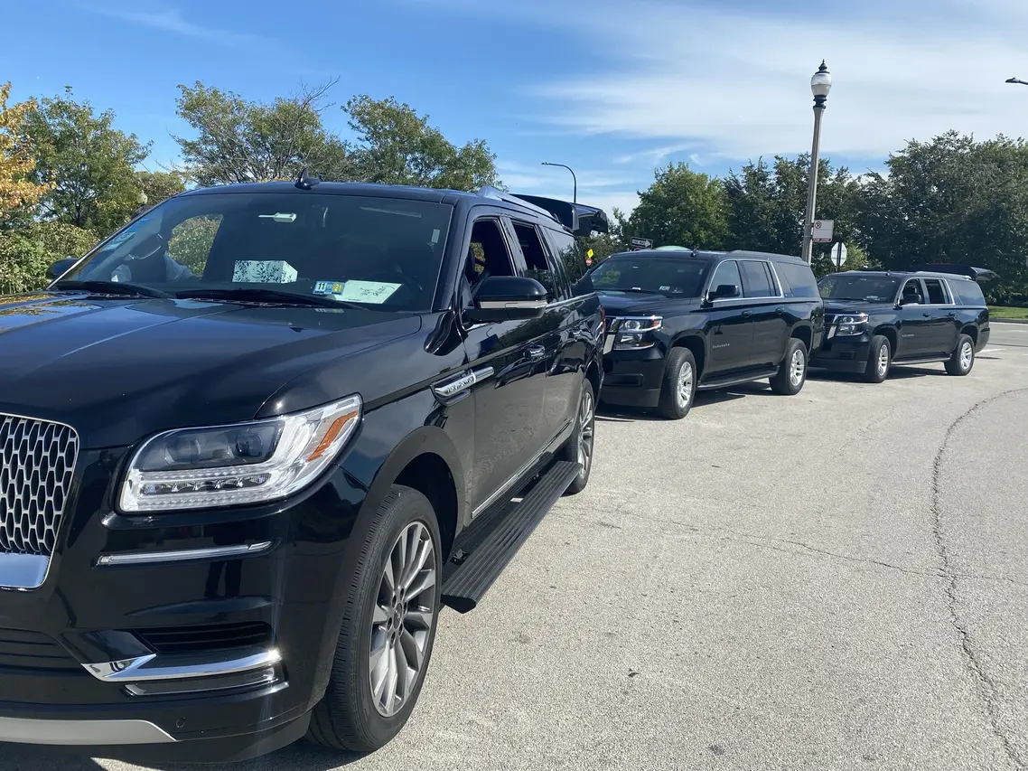 Black SUV Cars on road
