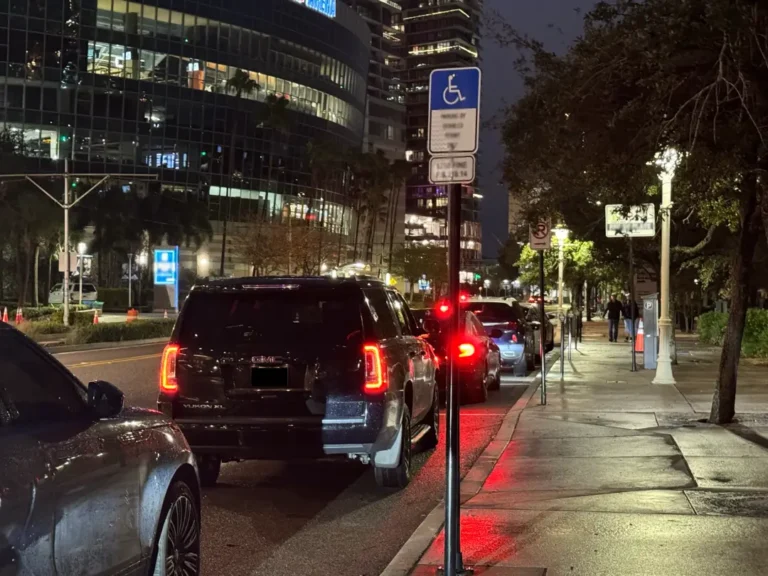 GMC Yukon back view at night