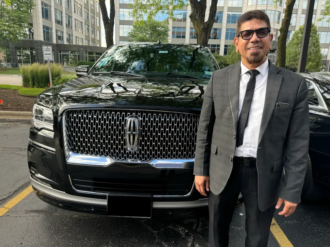 Chauffeur in front of navigator