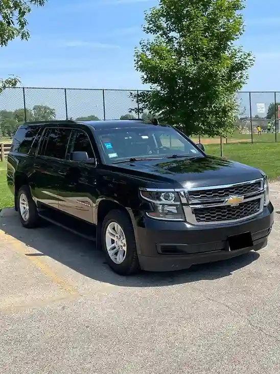 Chevy Suburban in park for hourly rates